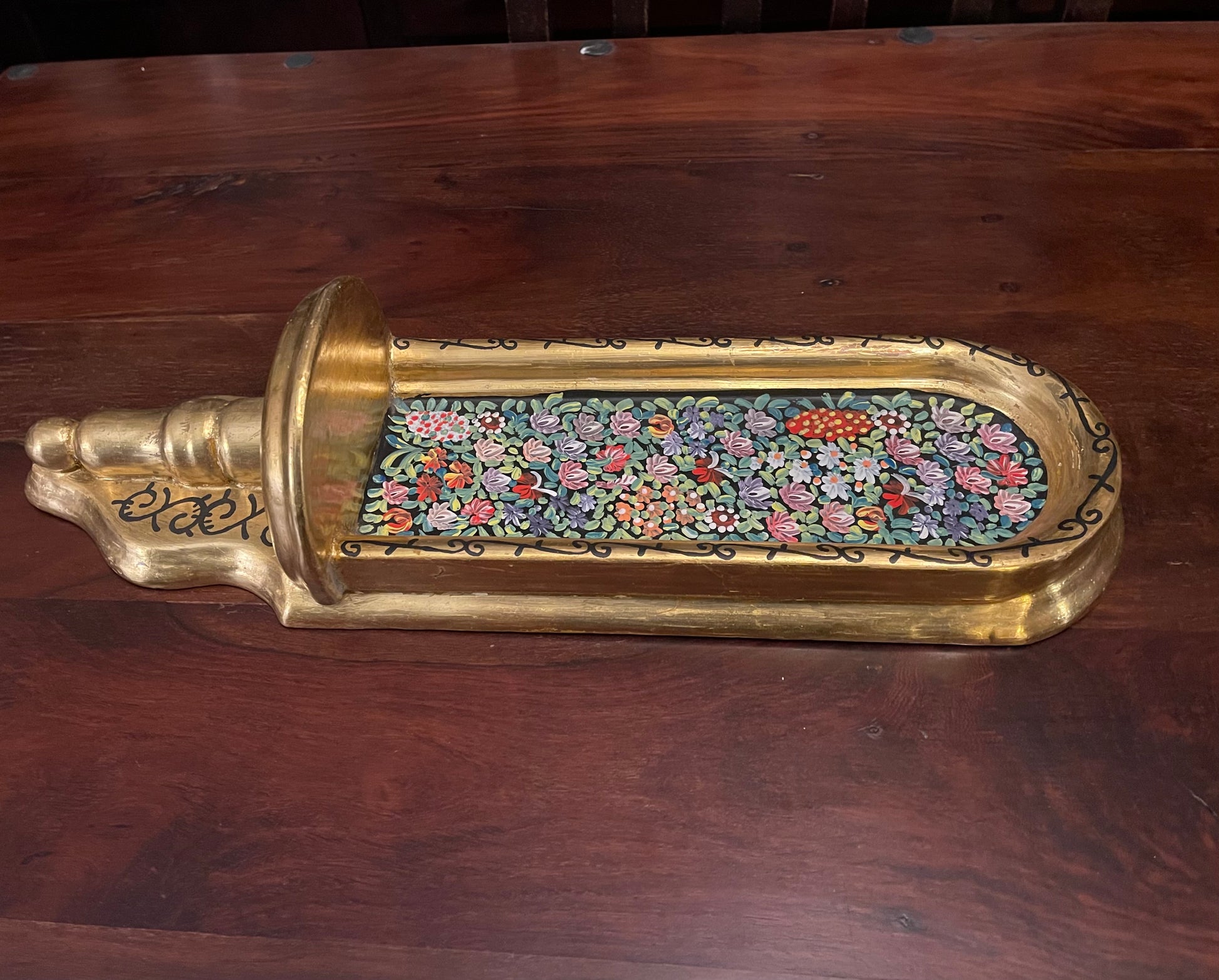 GOLD AND FLOWERED WALL SCONCE. Shrine of Hollywood Treasures and Relics Wall Art