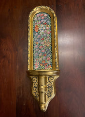 GOLD AND FLOWERED WALL SCONCE.